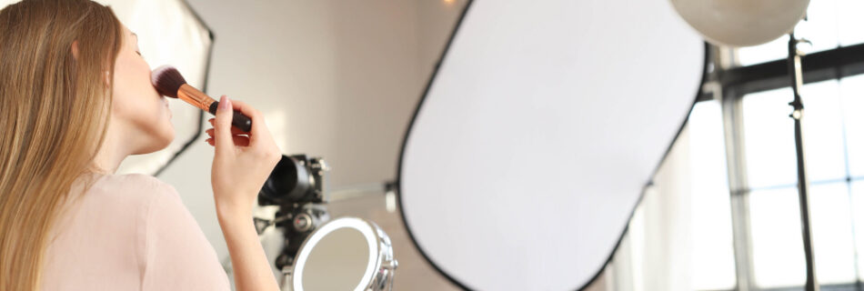 beauty vlogger young woman recording makeup tutorial